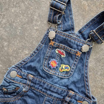 Outlet Suisse – Solderie & Neuf - Salopette jeans Manor Baby