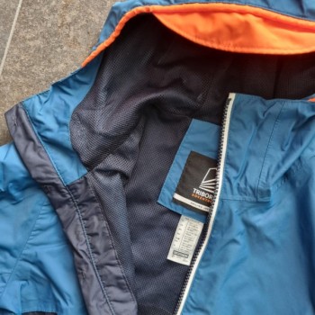 La Solderie suisse - Veste de pluie bleue Tribord Adventure taille 140