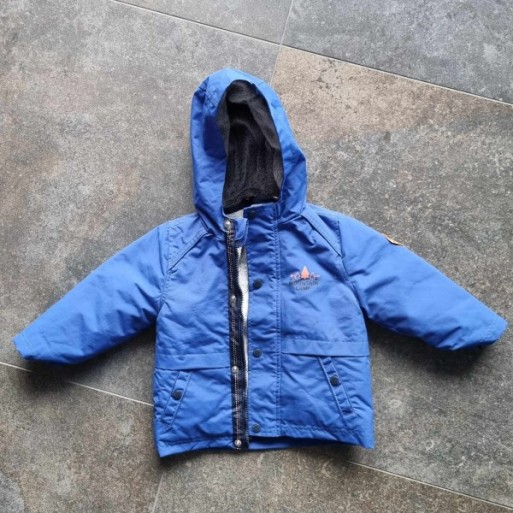 Outlet Suisse – Solderie & Neuf - Veste bleue de pluie à capuche