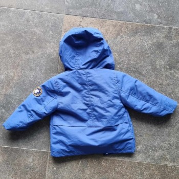 Outlet Suisse – Solderie & Neuf - Veste bleue de pluie à capuche