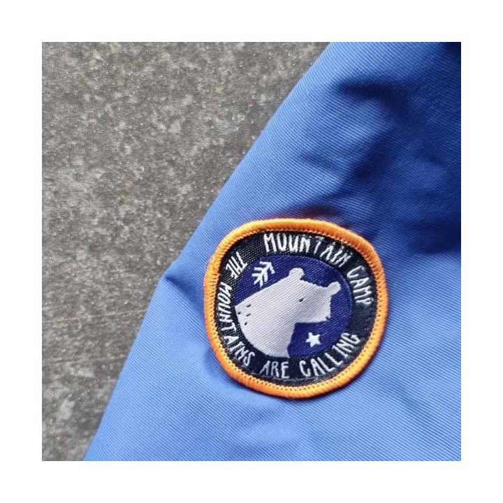 Outlet Suisse – Solderie & Neuf - Veste bleue de pluie à capuche